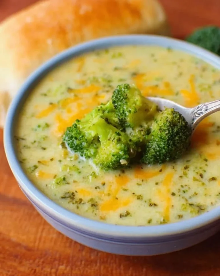 Bowl of homemade crockpot broccoli cheddar soup, copycat Panera recipe