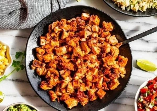 Healthy copycat recipe of Chipotle Chicken with vibrant spices and ingredients