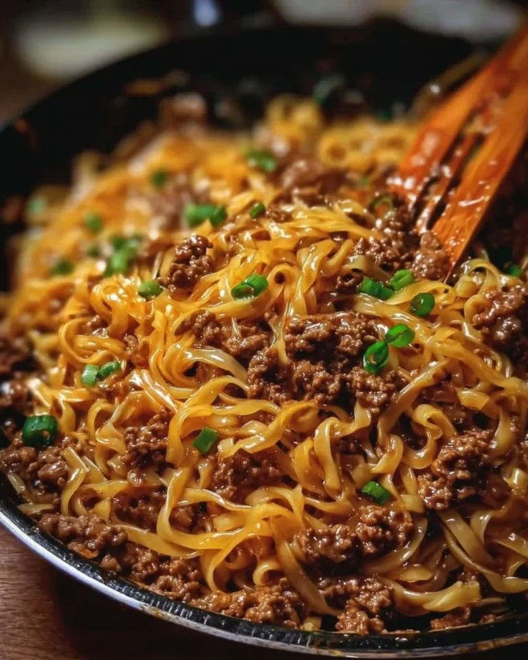 Delicious Mongolian beef noodles with ground beef and colorful vegetables