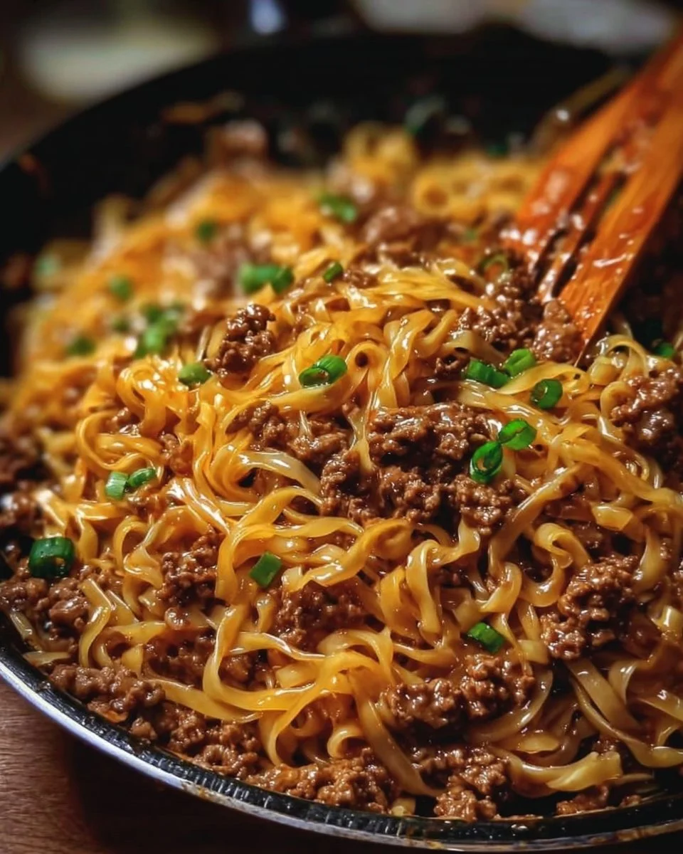 Delicious Mongolian beef noodles with ground beef and colorful vegetables