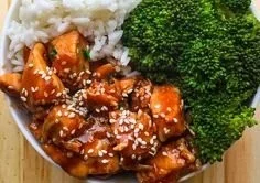 Delicious teriyaki chicken rice bowl with vegetables and sauce