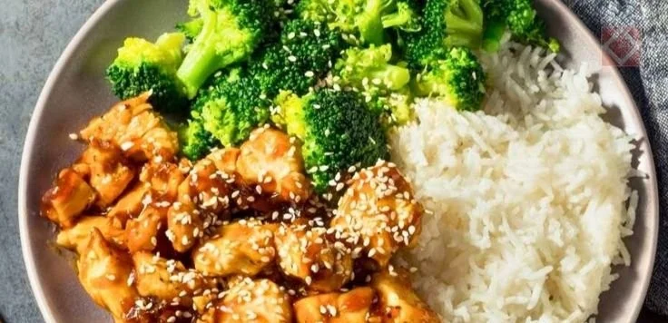 Crockpot teriyaki chicken served with rice and vegetables