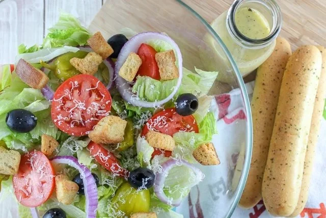Delicious Olive Garden house salad with fresh ingredients and dressing